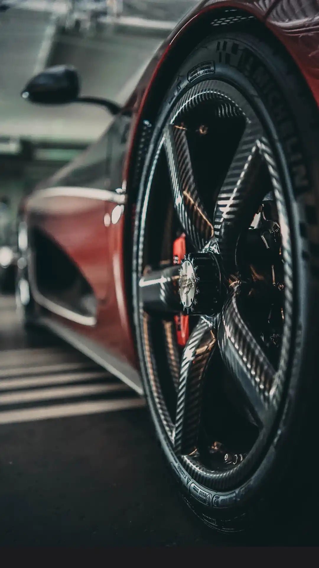 Close-up of a car wheel with a blurred background