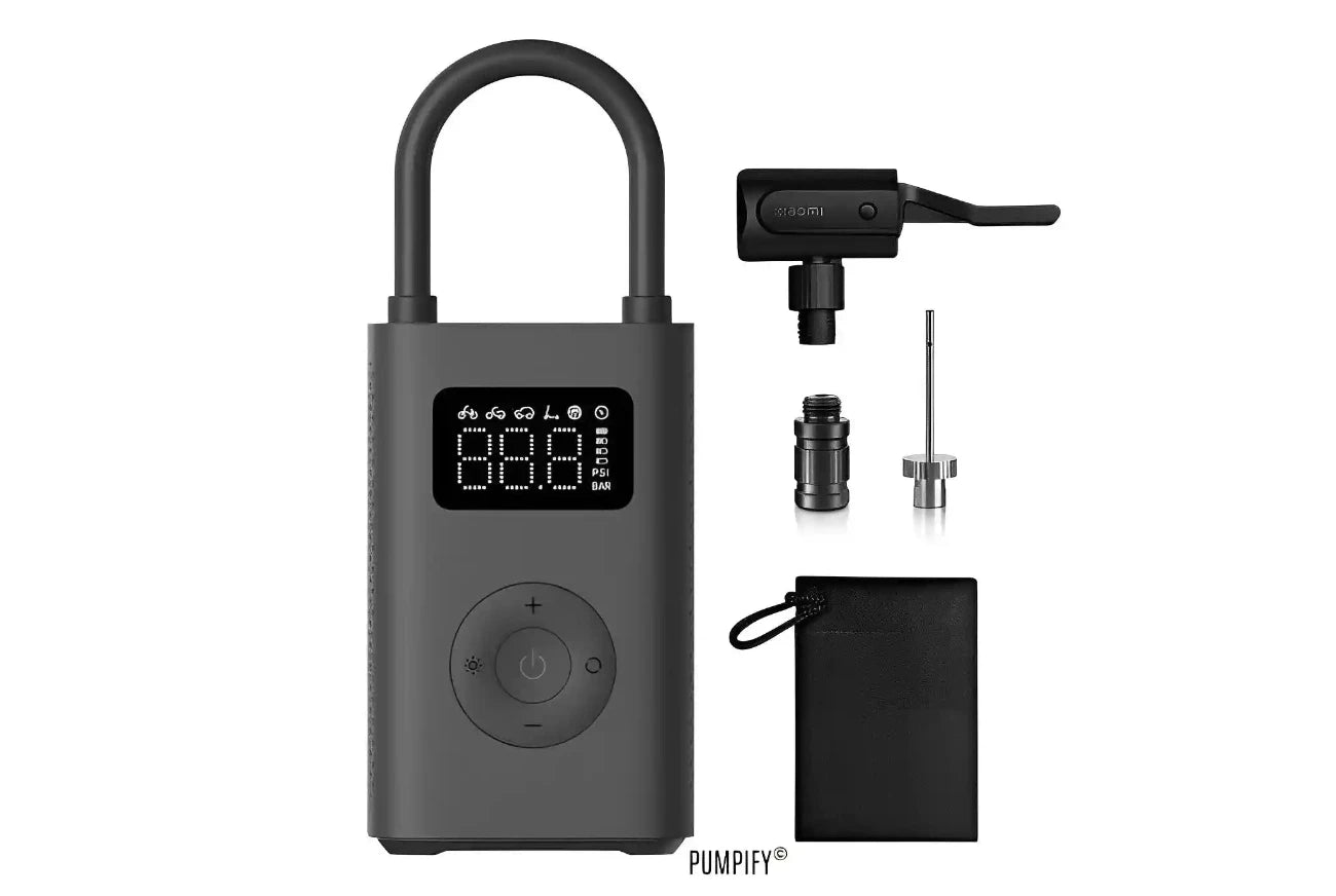 Xiaomi Mijia Portable Air Compressor 2 with various accessories including different nozzles, a power adapter, and a carrying pouch.