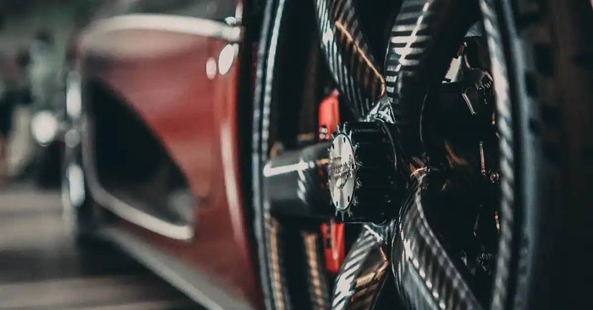 Close-up of a car wheel with a blurred background