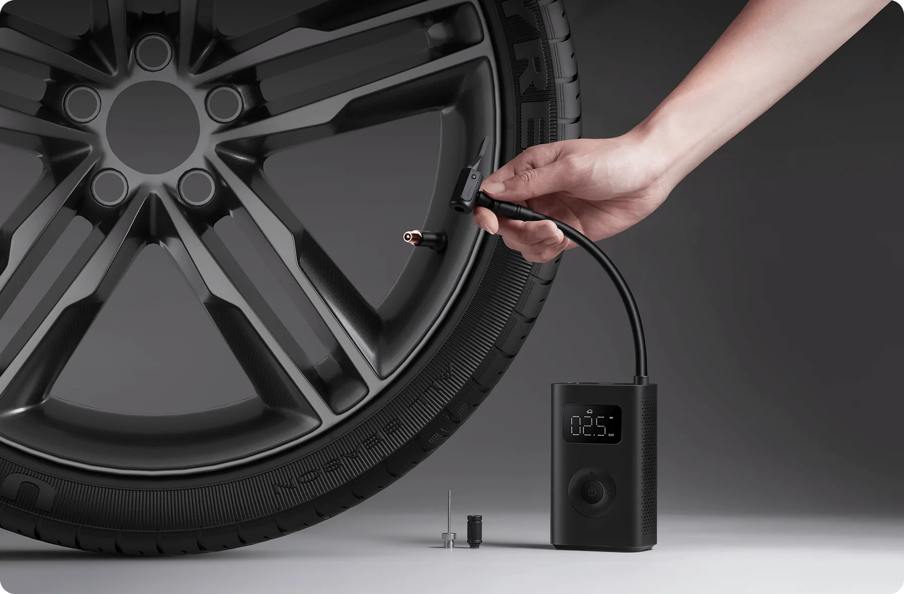Close-up of Woman Inflating Tire with Pumpify© Wireless Air Pump
